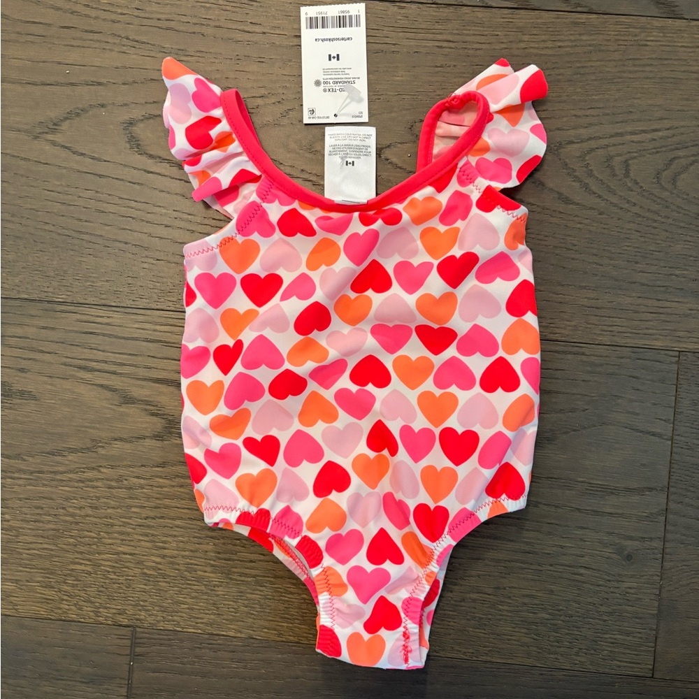 Carters baby girl swim suit sz 12M NWT retail $45